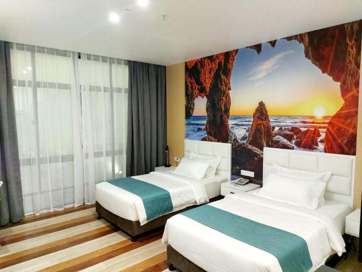 Fan'S Hotel Baybay Exterior foto